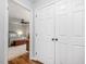 Hallway leading into the main bedroom with ensuite bath and closet at 6718 Twin Tree Ct, Raleigh, NC 27613
