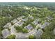 Aerial view of the neighborhood showcasing the community layout and surrounding greenery at 703 Kirkeenan Cir, Morrisville, NC 27560