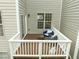 Private deck with seating, offering a relaxing outdoor space overlooking the backyard at 703 Kirkeenan Cir, Morrisville, NC 27560