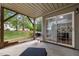 Cozy outdoor patio with a grill, perfect for outdoor cooking and entertaining, sliding glass door at 703 Kirkeenan Cir, Morrisville, NC 27560