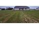 Extensive backyard with healthy lawn, backing to neighborhood homes at 72 Ruskin Dr, Smithfield, NC 27577