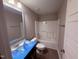 Bathroom featuring a tub-shower combo and a sink with chrome fixtures at 72 Ruskin Dr, Smithfield, NC 27577