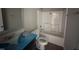 Bathroom featuring a shower and tub, with a toilet, and a vanity with a mirror at 72 Ruskin Dr, Smithfield, NC 27577