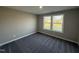 Cozy bedroom with a large window and neutral decor at 72 Ruskin Dr, Smithfield, NC 27577
