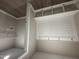 Functional mudroom with storage cubbies, hooks, and easy access to laundry at 72 Ruskin Dr, Smithfield, NC 27577