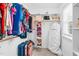 Walk-in closet with upper shelves and organized storage space for clothing and personal items at 7321 Clarincarde Ct, Wake Forest, NC 27587