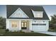 Inviting home featuring a well-manicured lawn, neutral siding, and a two-car garage at 743 W Holly Springs Rd, Holly Springs, NC 27540
