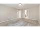 Neutral bedroom with carpet and a door to another room at 8013 Toddwick Ct, Raleigh, NC 27616