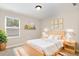 Cozy bedroom with charming décor, a bright window, and comfortable furnishings at 8013 Toddwick Ct, Raleigh, NC 27616
