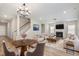 Bright living room with a fireplace, and comfortable seating at 8013 Toddwick Ct, Raleigh, NC 27616