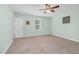 Bedroom with natural light and neutral carpet at 817 S Creek Dr, Nashville, NC 27856