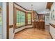 Breakfast nook with large windows offering views of the outdoor landscape at 817 S Creek Dr, Nashville, NC 27856