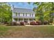 Charming two-story home featuring a lovely front porch, manicured landscaping, and welcoming curb appeal at 817 S Creek Dr, Nashville, NC 27856