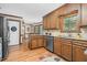 Well-appointed kitchen with granite countertops and stainless steel dishwasher at 817 S Creek Dr, Nashville, NC 27856