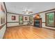 Spacious living room features hardwood floors and a fireplace at 817 S Creek Dr, Nashville, NC 27856
