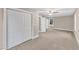 Bright bedroom with large closet space, neutral tones, carpet, and a ceiling fan at 8201 Rhodes Rd, Apex, NC 27539