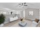 Living area features modern furnishings, hardwood flooring and neutral color palette at 8201 Rhodes Rd, Apex, NC 27539