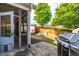 Backyard featuring a patio, grill, shed, play equipment, and fenced yard at 8525 Holdenby Trl, Raleigh, NC 27616