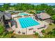 Aerial view of the community pool and lounge area with ample seating for residents to enjoy the summer at 8525 Holdenby Trl, Raleigh, NC 27616