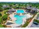 Aerial view of a community pool featuring a slide, area, and recreational swimming pool for residents at 8525 Holdenby Trl, Raleigh, NC 27616