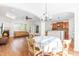 Bright dining area adjacent to kitchen and living room, perfect for Gathering meals and gatherings at 8525 Holdenby Trl, Raleigh, NC 27616