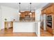 Spacious kitchen with granite countertops, stainless steel appliances, and ample cabinet space at 8525 Holdenby Trl, Raleigh, NC 27616