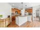 Well-equipped kitchen featuring an island, stainless steel appliances, and generous cabinet storage at 8525 Holdenby Trl, Raleigh, NC 27616