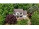Charming home with a lush, wooded lot, classic architectural details and attached garage at 928 Broadhaven Dr, Raleigh, NC 27603
