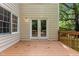 Back deck with wood railing and siding at 928 Broadhaven Dr, Raleigh, NC 27603