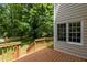 The home features a lovely, stained wood deck with direct access to a beautiful, fenced backyard at 928 Broadhaven Dr, Raleigh, NC 27603