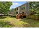 Expansive backyard featuring a manicured lawn and sturdy wood fence for privacy at 928 Broadhaven Dr, Raleigh, NC 27603