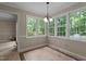 Bright breakfast nook featuring natural lighting, and decorative tile flooring at 928 Broadhaven Dr, Raleigh, NC 27603