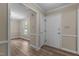 Home entryway featuring hardwood floors and neutral colored walls at 928 Broadhaven Dr, Raleigh, NC 27603