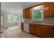 Kitchen featuring tile floors, eat-in breakfast nook, and light wood cabinets at 928 Broadhaven Dr, Raleigh, NC 27603