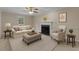Inviting living room with neutral tones, a fireplace, and comfortable seating at 928 Broadhaven Dr, Raleigh, NC 27603