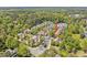 High angle aerial view of homes in the community near wooded area at 110 Tressel Way, Durham, NC 27707