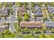 Overhead aerial of landscaped community of townhomes with mature trees at 110 Tressel Way, Durham, NC 27707
