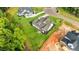 Bird's eye view of new construction home with well manicured lawn and an adjacent property at 1108 Delilia Ln, Wake Forest, NC 27587