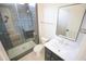 Modern bathroom featuring glass shower and sleek vanity at 1108 Delilia Ln, Wake Forest, NC 27587