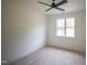 Unfinished bedroom space featuring a large window, and modern ceiling fan at 1108 Delilia Ln, Wake Forest, NC 27587