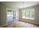 Charming dining area with access to screened porch and abundant natural light at 1108 Delilia Ln, Wake Forest, NC 27587