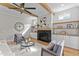Inviting living room featuring a fireplace and built-in shelves at 1108 Delilia Ln, Wake Forest, NC 27587