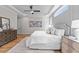 Bright and spacious bedroom with hardwood floors and tray ceiling at 1108 Delilia Ln, Wake Forest, NC 27587