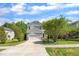 Charming two-story home with a manicured lawn, a two-car garage, and inviting curb appeal at 1198 Shining Water Ln, Creedmoor, NC 27522
