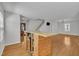 Open floor plan featuring a kitchen with breakfast bar and view of the staircase at 1198 Shining Water Ln, Creedmoor, NC 27522