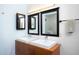 Modern bathroom featuring double sinks, sleek mirrors, and a streamlined design, creating a clean, sophisticated space at 130 Hunt St # 107, Durham, NC 27701
