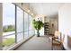 Hallway with large windows and comfortable seating area at 130 Hunt St # 107, Durham, NC 27701