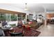 Bright and airy living room with large windows, hardwood floors, and an open floor plan at 130 Hunt St # 107, Durham, NC 27701