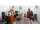 Functional office space with a wooden desk, ample storage, and natural light, ideal for productivity at 130 Hunt St # 107, Durham, NC 27701