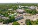 Cityscape view featuring modern apartment buildings and surrounding greenery from above at 1302 Chamblee Hill Ct, Raleigh, NC 27608